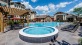 spacious pool and jacuzzi area