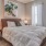 Bedroom with natural lighting and high ceilings
