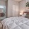 Bedroom with natural lighting and high ceilings