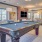 Spacious gameroom with billiards